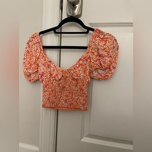 Orange and pink floral ruched crop top